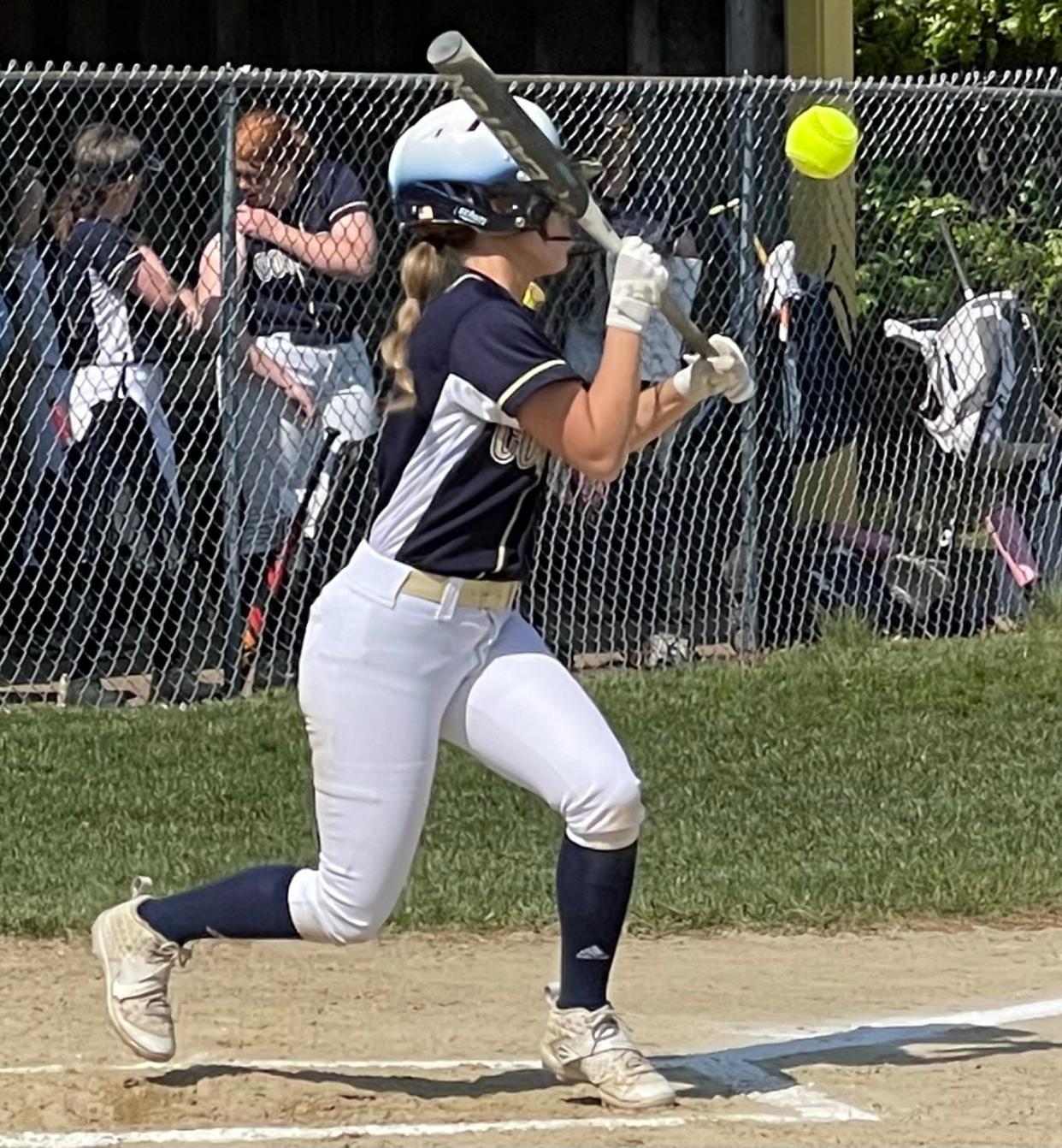 Tri-County junior shortstop Ava Cossette drops down a bunt against Westford on Thursday, May 18, 2023.