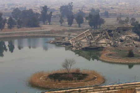 Destroyed buildings Saddam Hussein's palaces are seen during a battle with Islamic State militants in southern Mosul, Iraq, January 21, 2017. REUTERS/Alaa Al-Marjani