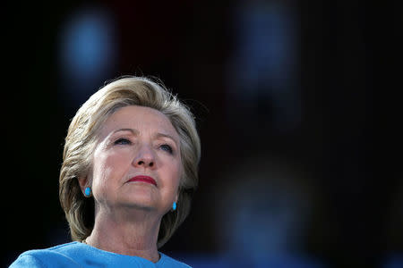 U.S. Democratic presidential nominee Hillary Clinton attends a campaign rally at Alumni Hall Courtyard, Saint Anselm College in Manchester, New Hampshire U.S., October 24, 2016. REUTERS/Carlos Barria