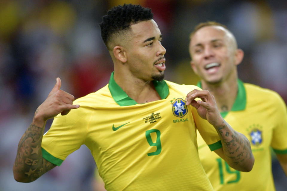 Brazil's Gabriel Jesus (L) celebrates after scoring against Peru during the Copa America football tournament final match at Maracana Stadium in Rio de Janeiro, Brazil, on July 7, 2019. (Photo by Raul ARBOLEDA / AFP)        (Photo credit should read RAUL ARBOLEDA/AFP/Getty Images)