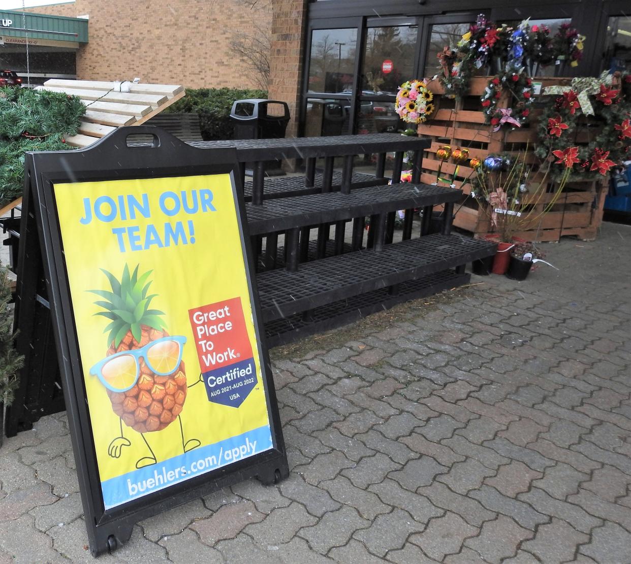 A sign outside of Buehler's Fresh Foods of Coshocton encourages people to join their team. The store is just one of many businesses in Coshocton looking for employees.