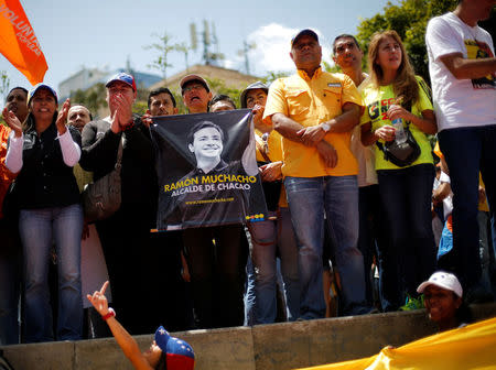 Opposition supporters rally against Venezuela's President Nicolas Maduro's government in Caracas, Venezuela, August 12, 2017. REUTERS/Andres Martinez Casares