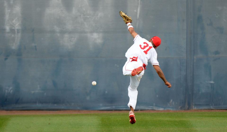 Hueneme’s Mathew Carpintero dives but can't make the catch against Baldwin Park during the CIF-SS Division 7 title game at Cal State Fullerton on Friday, May 20, 2022. Hueneme lost 4-2.