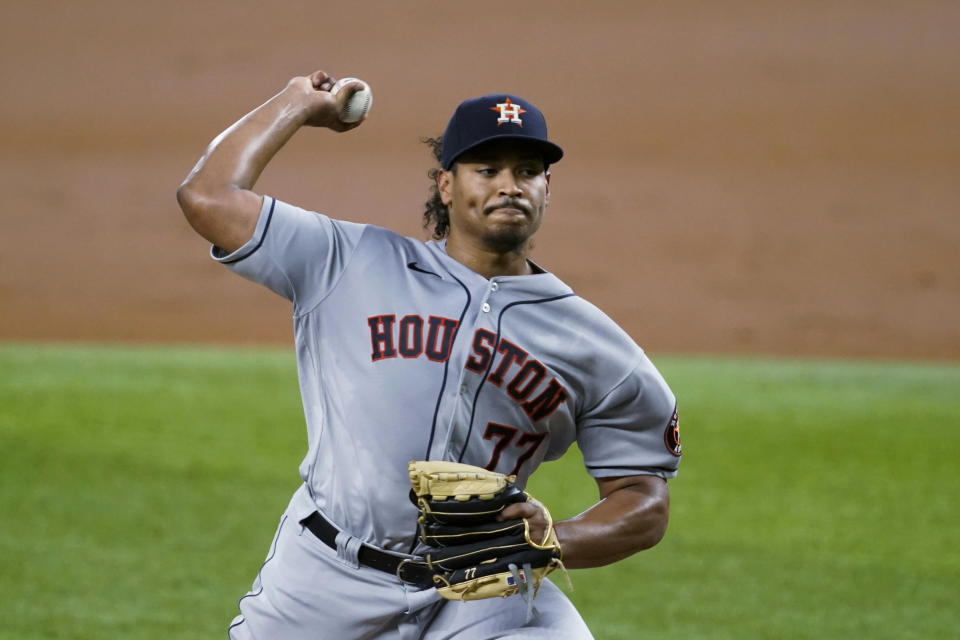 Houston Astros starting pitcher Luis Garcia throws during the third inning of the team's baseball game against the Texas Rangers in Arlington, Texas, Thursday, Sept. 16, 2021. (AP Photo/Tony Gutierrez)