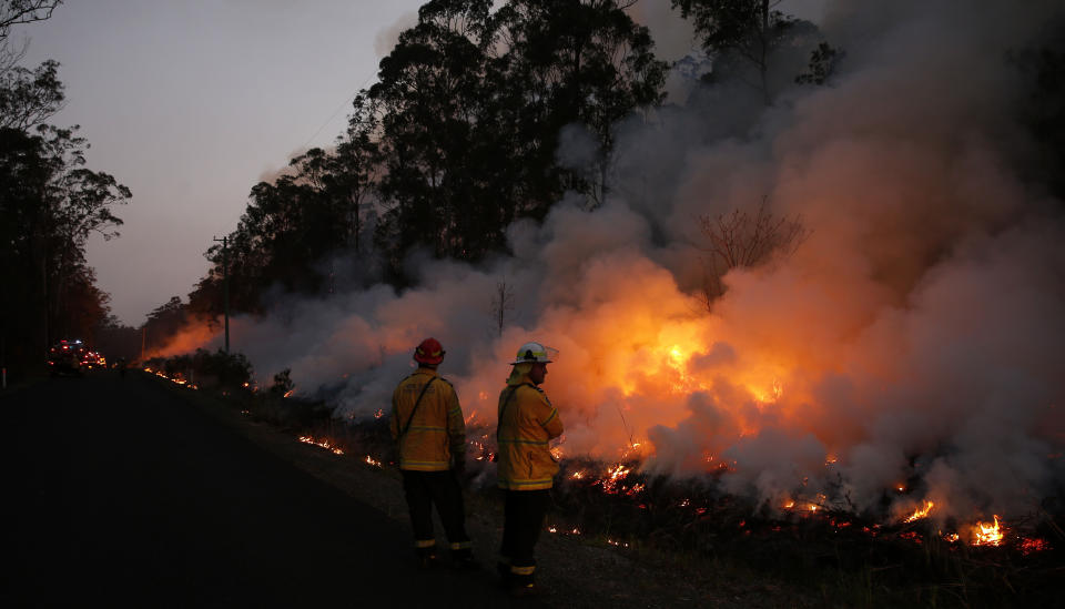  Almost 1200 firefighters are tackling large bushfires on the NSW mid-north coast among scores of blazes around NSW. Source: AAP Image.