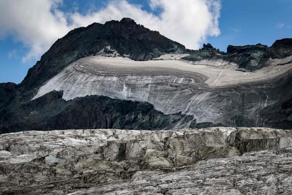 A picture taken on July 30, 2022 shows the Fee Glacier above the Swiss alpine resort of Saas-Fee on July 30, 2022.  / Credit: FABRICE COFFRINI/AFP via Getty Images