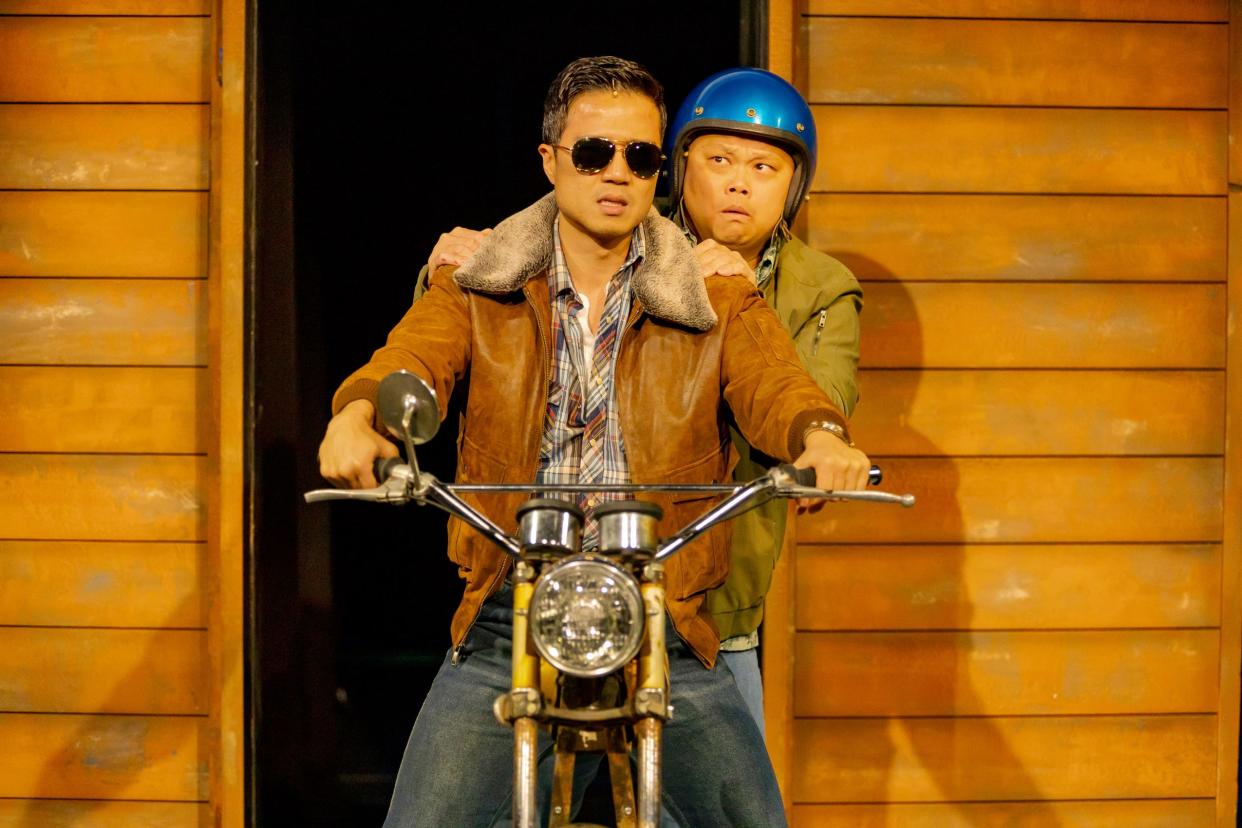In “Vietgone,” now at the Playhouse in the Park through June 2, Hyunmin Rhee, front, and Viet Vo play recent Vietnamese immigrants who set out on a cross-country trip on what one of them describes as a “rusted-out death bike.”
