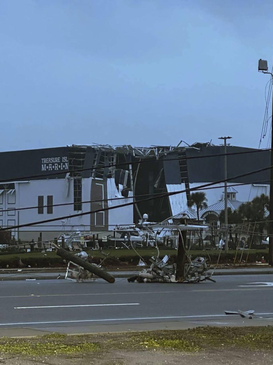 This photo provided by Bay County Sheriff's Office shows storm damage around around Panama City Beach, Fla., in Bay County, early Tuesday, Jan. 9, 2024. A sprawling storm has hit the South with strong thunderstorms and tornado warnings that blew roofs off homes and tossed about furniture in the Florida Panhandle and brought cities across the Midwest to a standstill with more than half of foot of snow. (Bay County Sheriff's Office via AP)