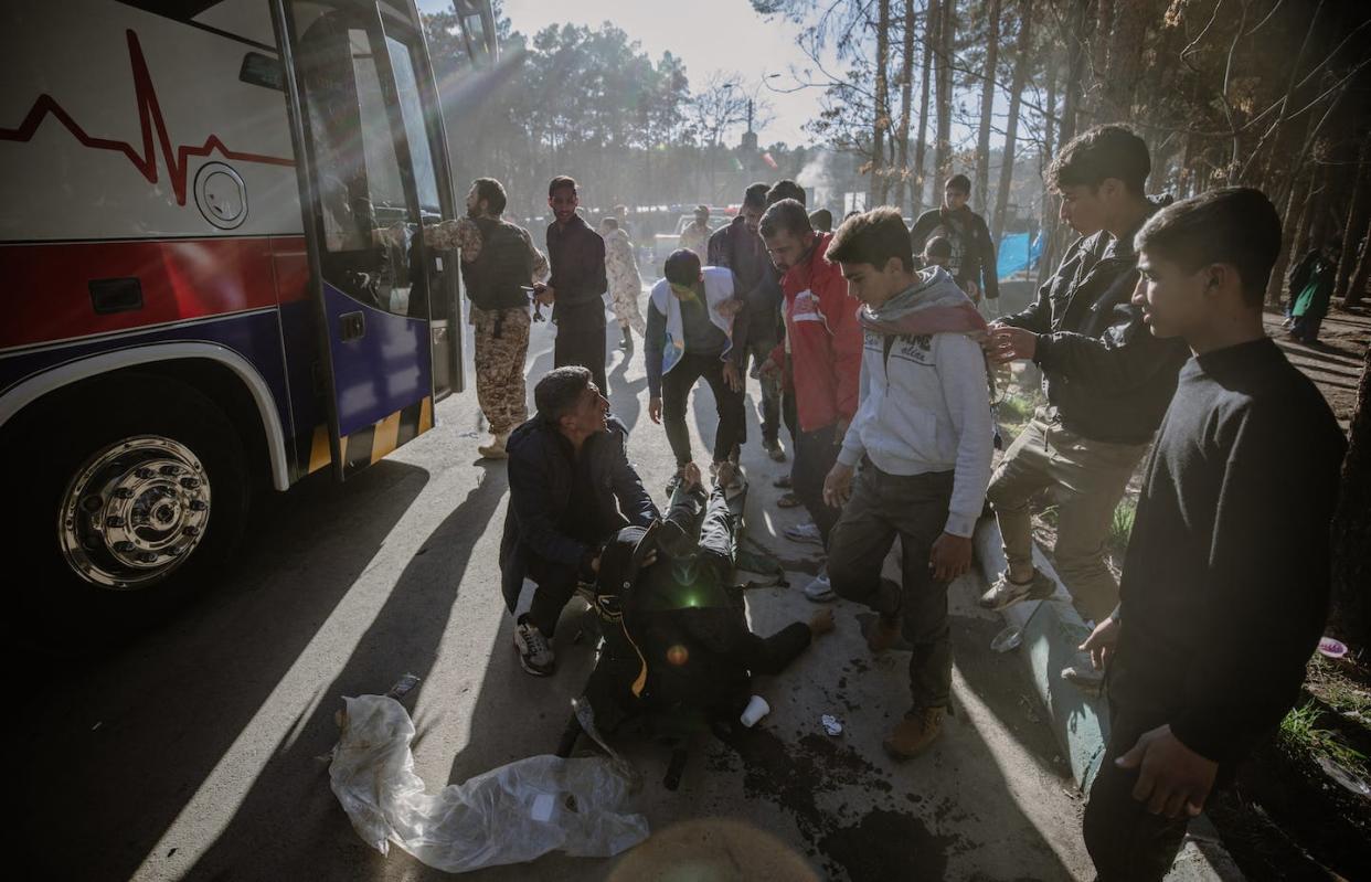 More than 100 peope were killed in the blast in Kerman, Iran, on Jan. 3, 2024. <a href="https://www.gettyimages.com/detail/news-photo/kerman-iran-people-disperse-near-the-scene-where-explosions-news-photo/1898126156?adppopup=true" rel="nofollow noopener" target="_blank" data-ylk="slk:Mahdi/Middle East Images/AFP via Getty Images;elm:context_link;itc:0;sec:content-canvas" class="link ">Mahdi/Middle East Images/AFP via Getty Images</a>