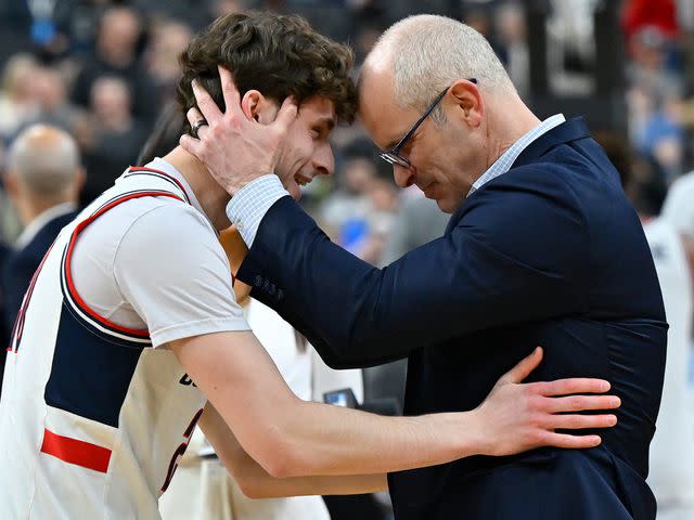 <p>David Becker/AP</p> Dan Hurley reacts with guard and son Andrew Hurley after the 88-65 win against Arkansas of a Sweet 16 college basketball game on March 23, 2023.