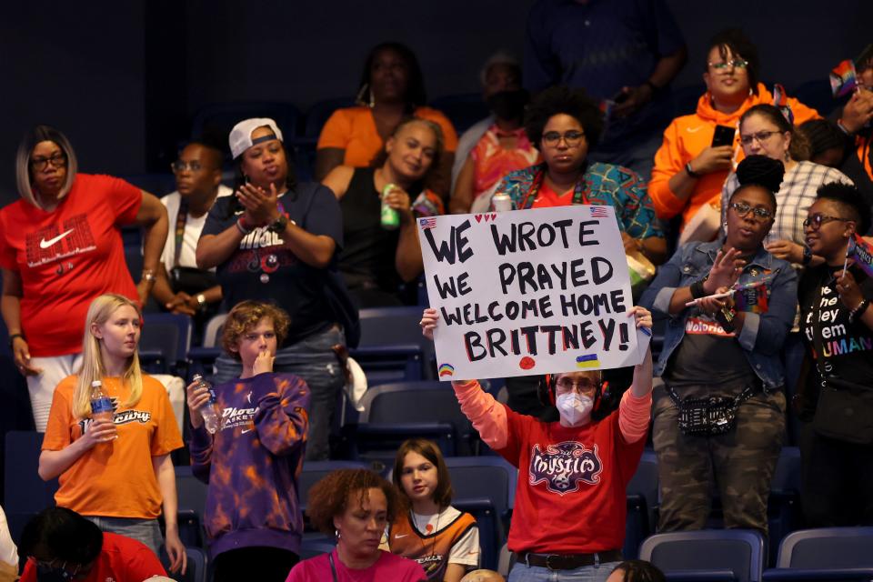 A fan holds up a sign supporting the Phoenix Mercury's Brittney Griner.