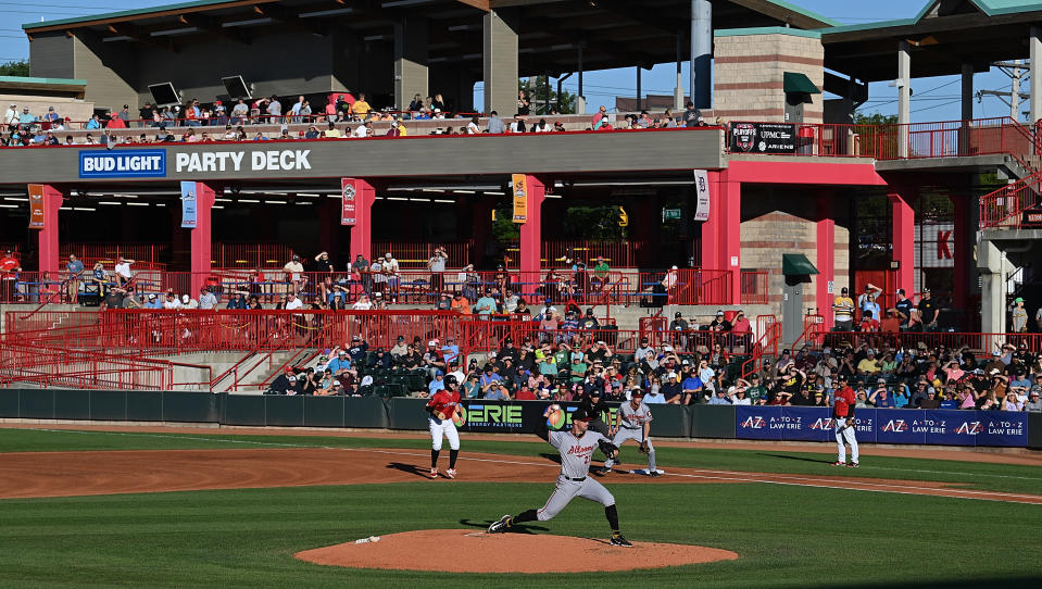 Fans cheer during an Erie SeaWolves game at UPMC Park in Erie, Pennsylvania