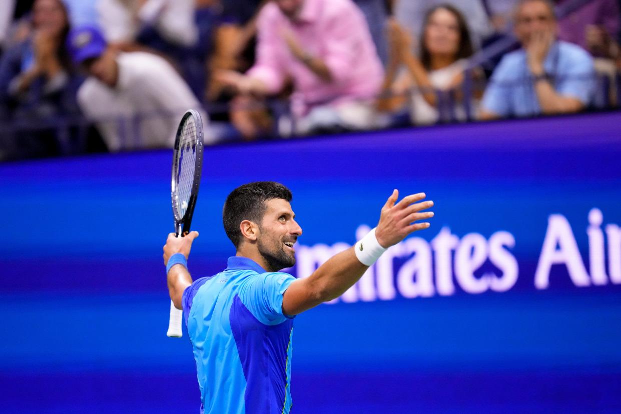 Novak Djokovic, of Serbia, reacts after a point against Daniil Medvedev (AP)