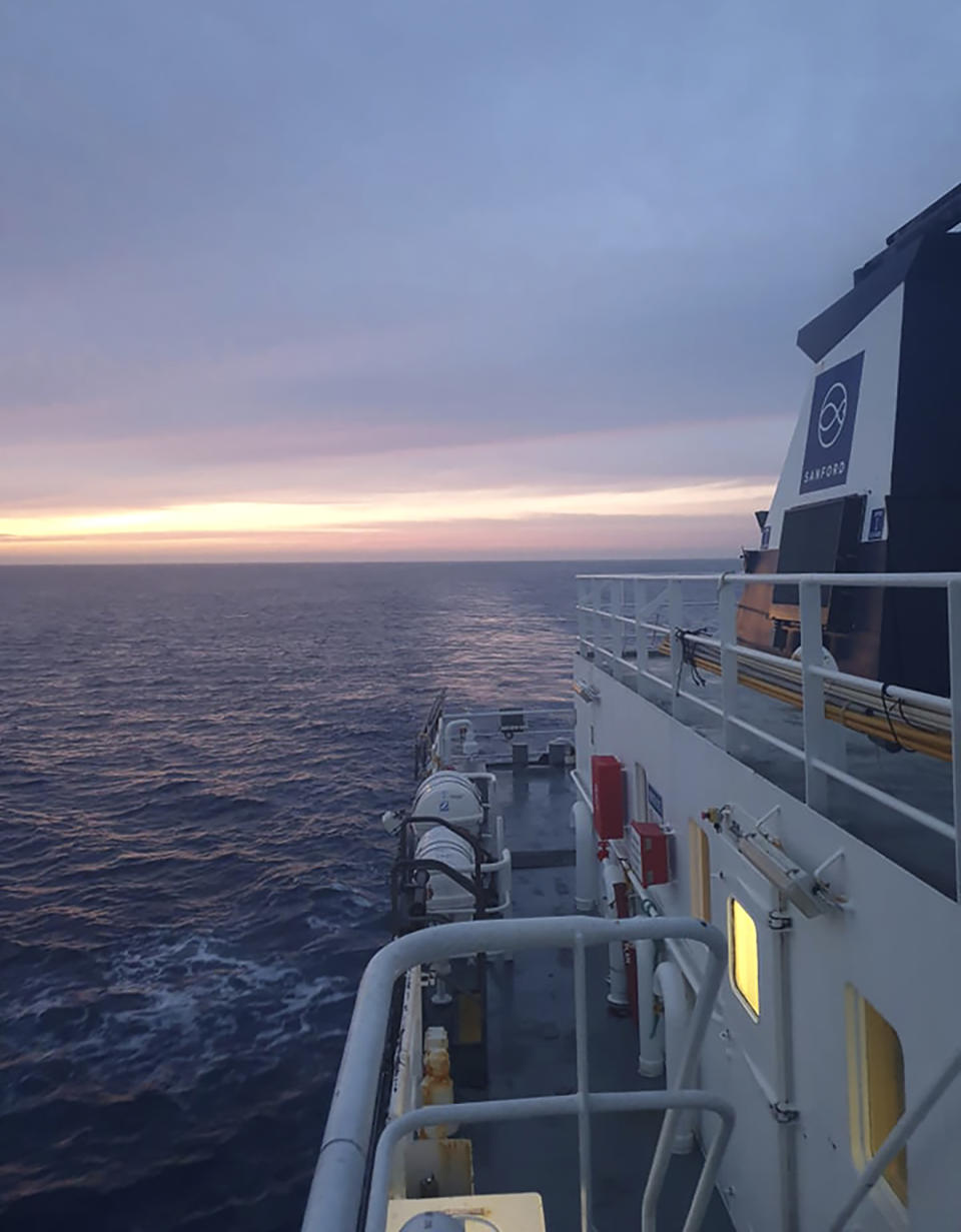 This July 2020 photo supplied by Feeonaa/Neville Clifton, shows the San Aotea II fishing boat in Southern Ocean. The Cliftons, a honeymoon couple who were stranded on the remote Falkland Islands in March because of the coronavirus have managed to get home to New Zealand, Tuesday Aug. 4, 2020 by hitching a lift of more than 5,000 nautical miles on an Antarctic fishing boat. (Feeonaa/Neville Clifton via AP)