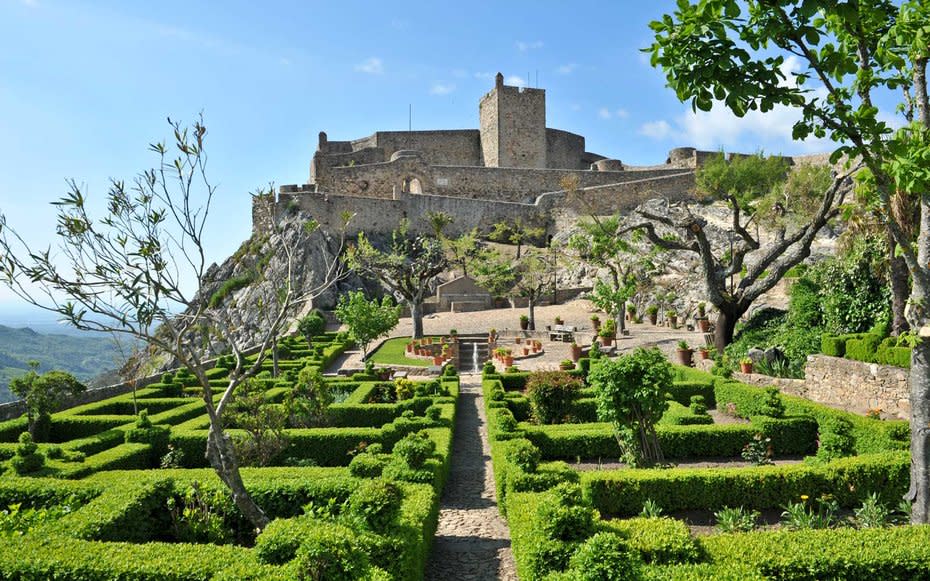 <p>You can find the Castelo de Marvo on the central border of Portugal and Spain. The castle can be seen for miles, thanks to its perch on one of the highest points in the Serra de So Mamede. The surrounding ridge was the perfect natural defense against enemies when this castle was in its prime back in the 12<sup>th</sup> centurythe location was mainly used to track enemy forces from Valencia de Alcntra in Spain. Today, you can walk around the incredibly preserved walls and take in the spanning views of two stunning countrysides.</p>