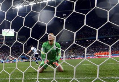 Jasper Cillessen looks back after Argentina's Maxi Rodriguez scored the winning penalty kick. (AP)