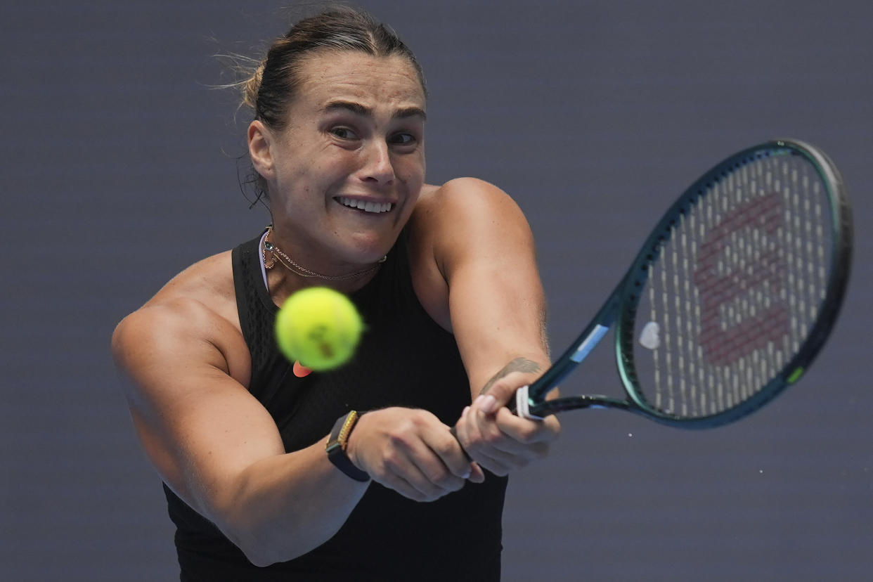 Aryna Sabalenka of Belarus returns a shot to Mananchaya Sawangkaew of Thailand during the China Open tennis tournament held at the National Tennis Center in Beijing, Saturday, Sept. 28, 2024. (AP Photo/Ng Han Guan)