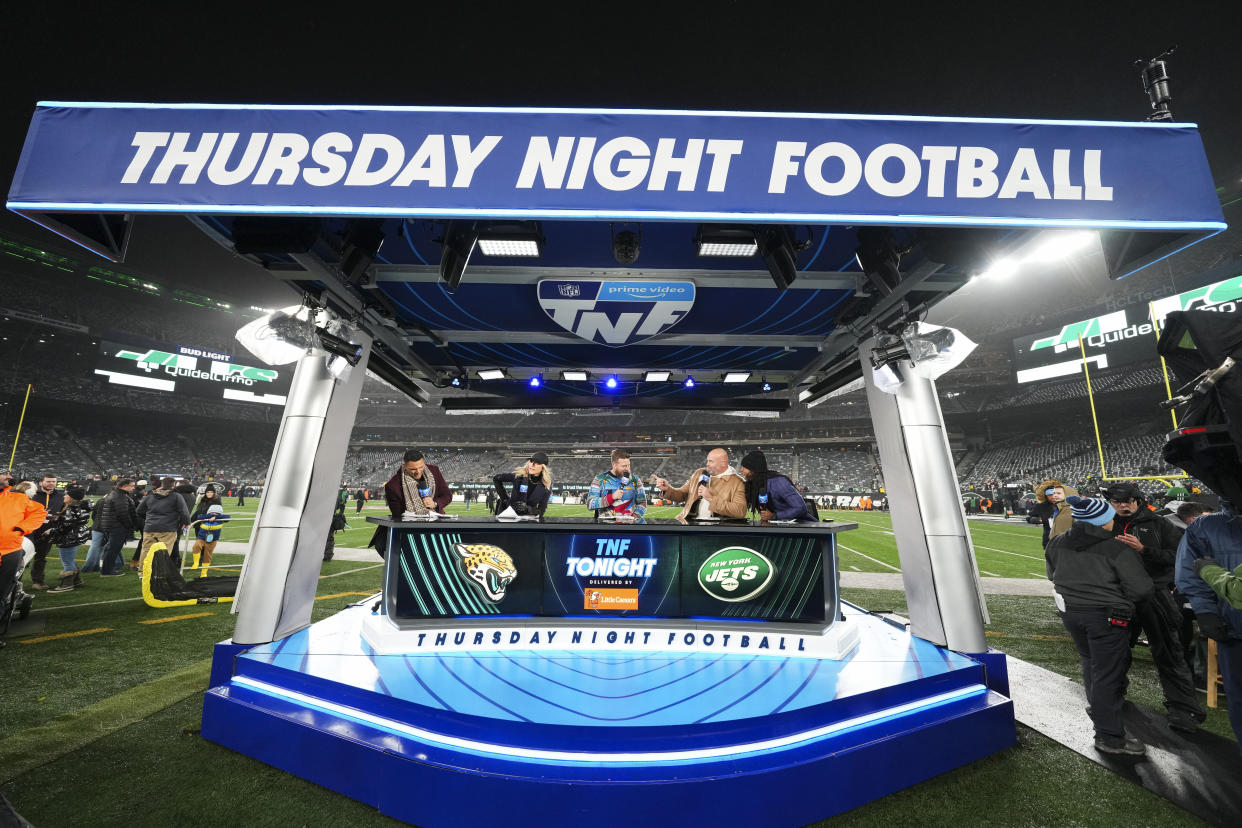 EAST RUTHERFORD, NJ - DECEMBER 22: Amazon Prime Video Thursday Night Football analyst Ryan Fitzpatrick speaks prior to the game between the Jacksonville Jaguars and the New York Jets at MetLife Stadium on December 22, 2022 in East Rutherford, New Jersey. (Photo by Cooper Neill/Getty Images)