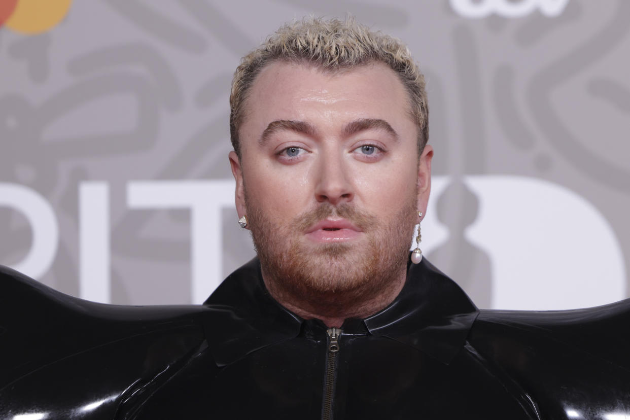 Sam Smith poses for photographers upon arrival at the Brit Awards 2023 in London, Saturday, Feb. 11, 2023. (Photo by Vianney Le Caer/Invision/AP)