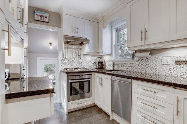 <p><span>378 Cleveland St., Toronto, Ont.</span><br> There are heated floors in the kitchen and the bathroom.<br> (Photo: Zoocasa) </p>