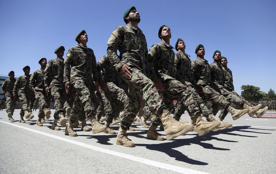 Afghan National Army march during their graduation ceremony from a 3-month training program at the Afghan Military Academy in Kabul, Afghanistan, Monday, May 27, 2019. (AP Photo/Rahmat Gul)