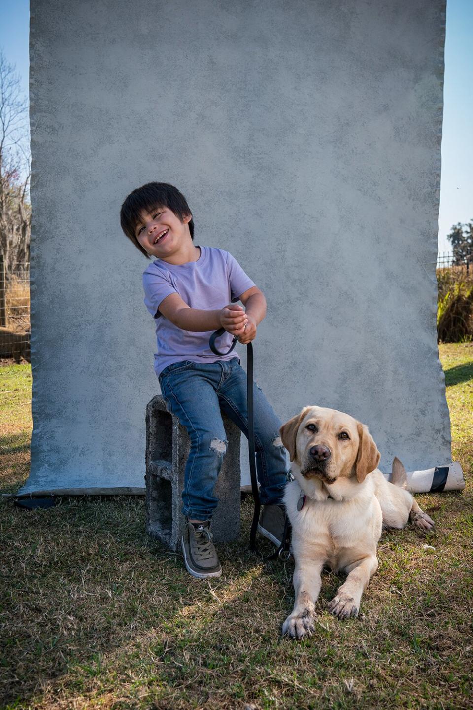 Blind Boy and Companion Dog Merlot Bond