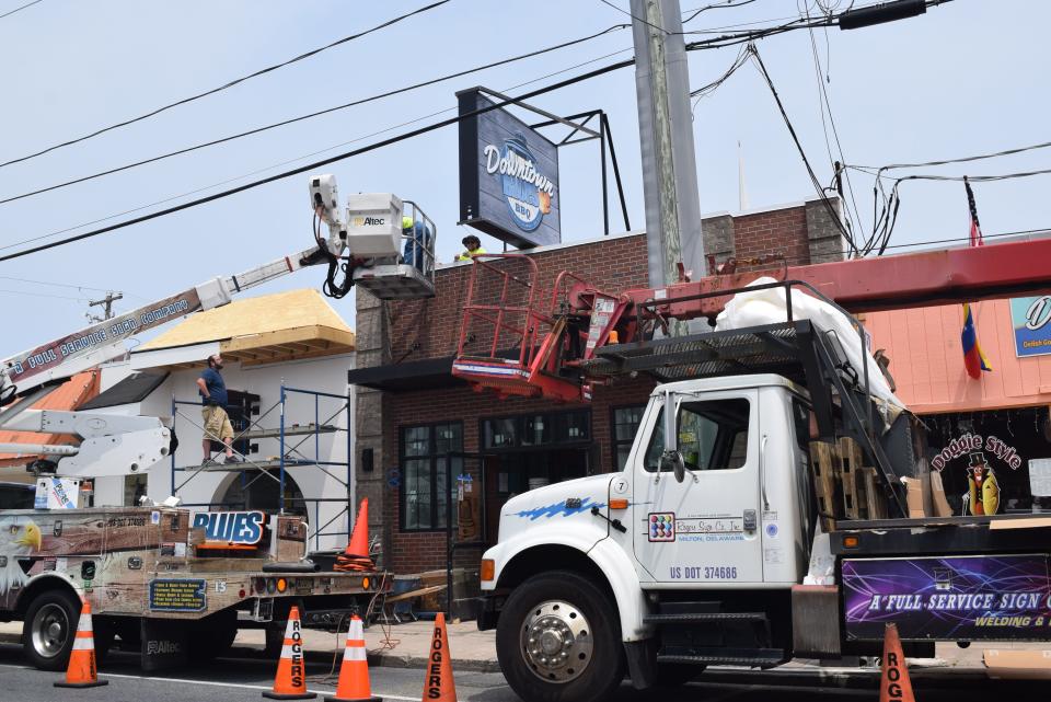 The "Downtown Blues" sign is placed on First Street in Rehoboth Beach on May 24, 2023. The restaurant will take over the former Nicola Pizza location.