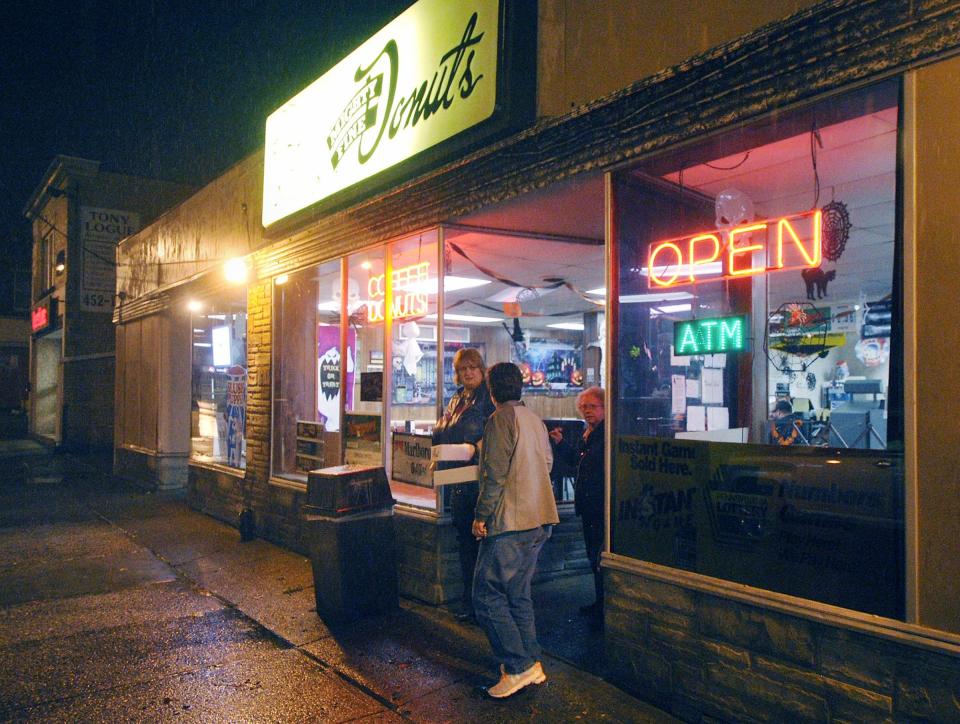 Customers leave Mighty Fine Donuts in Erie. Several buyers have reached an agreement to buy the iconic Erie donut shop. The asking price was $795,000.