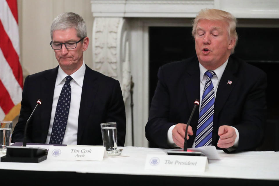 Apple CEO Tim Cook listens to US President Donald Trump during a meeting of the American Technology Council (Chip Somodevilla/Getty Images)