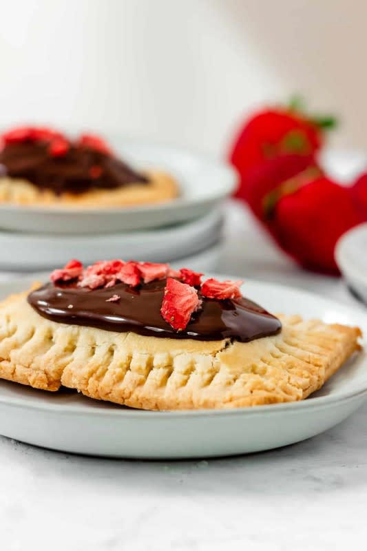 <p>Baked Ambrosia</p><p>Healthy, gluten-free paleo chocolate-covered strawberry pop tarts made with a fresh strawberry filling. This healthy make-ahead breakfast, snack or dessert is easy to make, and perfect for using up your summer strawberries!</p><p><strong>Get the recipe: <a href="https://www.bakedambrosia.com/paleo-chocolate-covered-strawberry-pop-tarts/" rel="nofollow noopener" target="_blank" data-ylk="slk:Chocolate-Covered Strawberry Pop Tarts;elm:context_link;itc:0;sec:content-canvas" class="link "><em>Chocolate-Covered Strawberry Pop Tarts</em></a></strong></p>