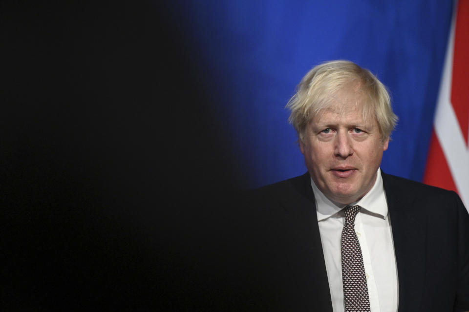 Britain's Prime Minister Boris Johnson addresses the media regarding Britain's COVID-19 infection rate and vaccination campaign, in Downing Street, London, Monday Nov. 15, 2021. (Leon Neal/Pool via AP)