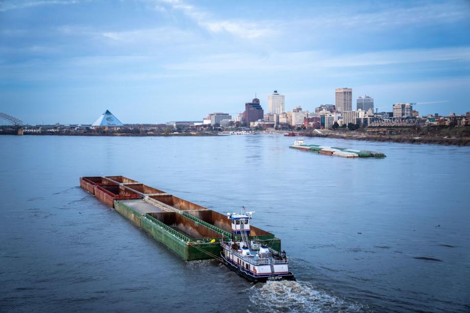 Barges and tugboats in the river near Memphis