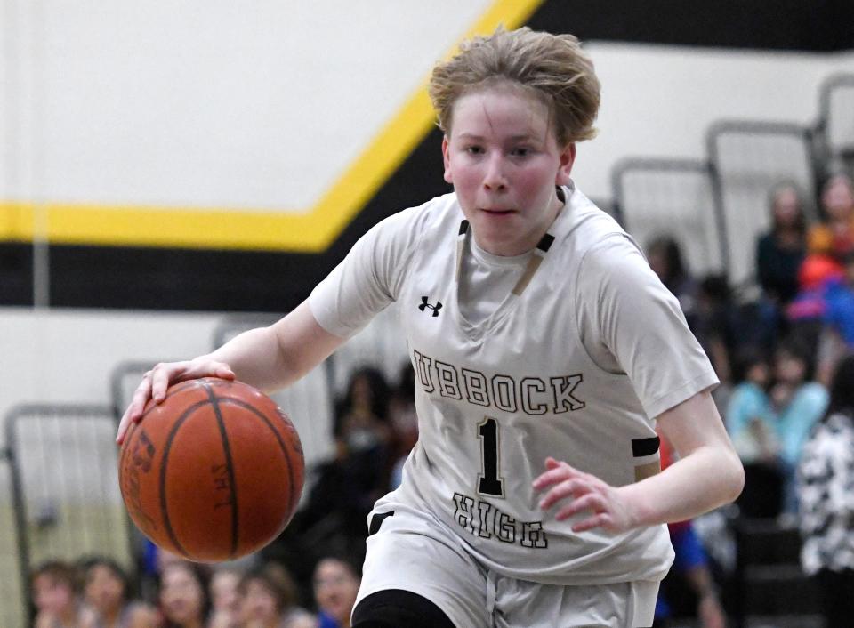 Lubbock High's Izzy Palmer dribbles the ball against Abilene Cooper on Tuesday at Westerner Arena.