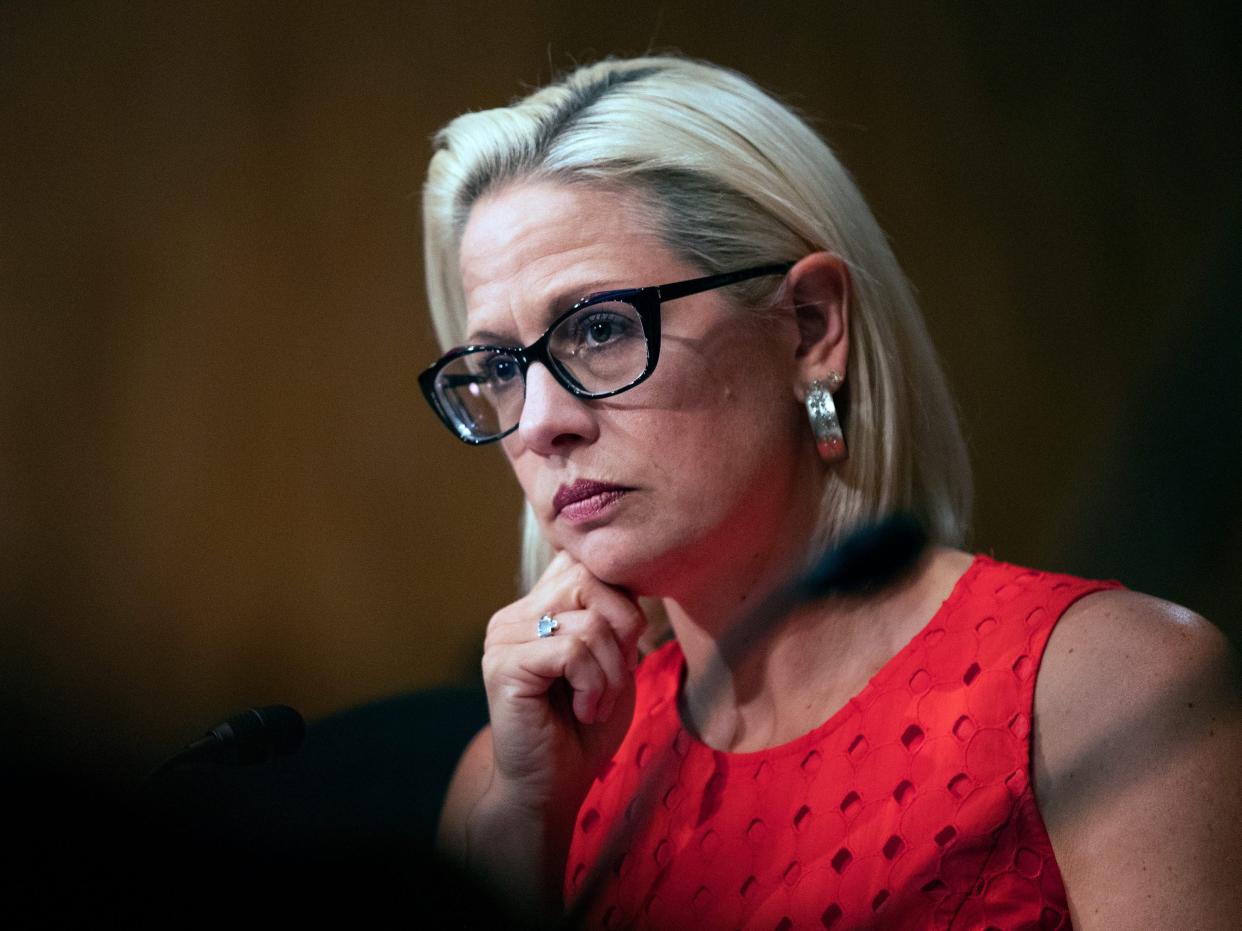 In this July 16, 2019, file photo, Senate Security and Governmental Affairs Committee member Sen. Kyrsten Sinema, D-Ariz., listens to witnesses during a hearing on 2020 census on Capitol Hill in Washington.