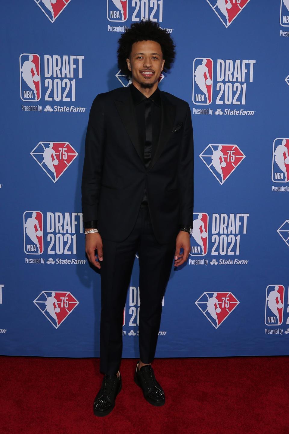 Jul 29, 2021; Brooklyn, New York, USA; Cade Cunningham (Oklahoma State) arrives on the red carpet before the 2021 NBA Draft at Barclays Center. Mandatory Credit: Brad Penner-USA TODAY Sports