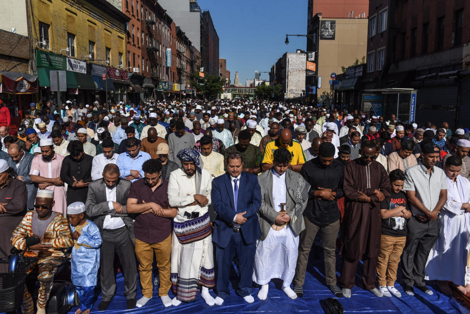 People pray outside a mosque to mark the end of the Muslim holy month of Ramadan in Brooklyn, New York, on June 4, 2019. (Photo: Stephanie Keith via Getty Images)