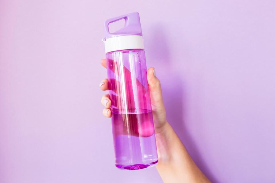 <p>Keep those fluids coming! "<a href="https://www.goodhousekeeping.com/health/diet-nutrition/a46956/how-much-water-should-i-drink/" rel="nofollow noopener" target="_blank" data-ylk="slk:Being dehydrated;elm:context_link;itc:0;sec:content-canvas" class="link ">Being dehydrated</a> causes the body to hoard water," says <em>The Biggest Loser</em> trainer Kim Lyons. This can lead you to carry up to four excess pounds around your midsection. Drinking water also helps your body handle the extra fiber you’re ingesting. (Cruciferous veggies and legumes are especially known for causing gas pain if you’re not adequately hydrated.) Aim for <a href="https://www.goodhousekeeping.com/health/diet-nutrition/a38687/ways-to-stay-hydrated-this-summer/" rel="nofollow noopener" target="_blank" data-ylk="slk:at least eight cups of water;elm:context_link;itc:0;sec:content-canvas" class="link ">at least eight cups of water</a> or other fluids daily. </p>