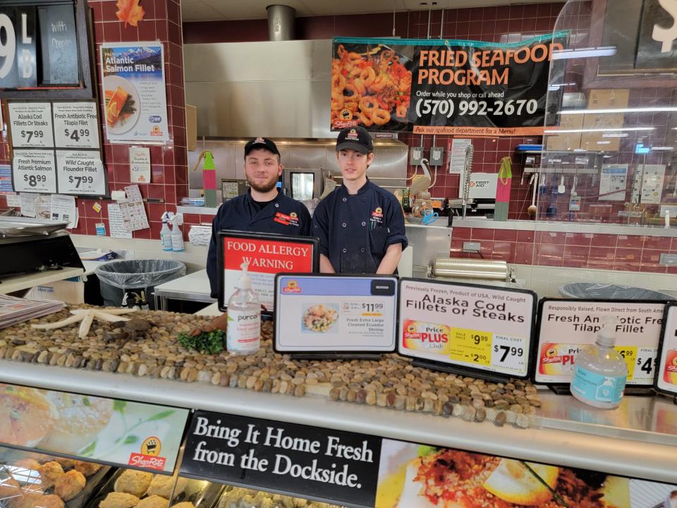 Braden Burlew and Nathan Clark at Fisherman's Cove offer a large selection of fresh fish and seafood at Kinsley's ShopRite in Brodheadsville.