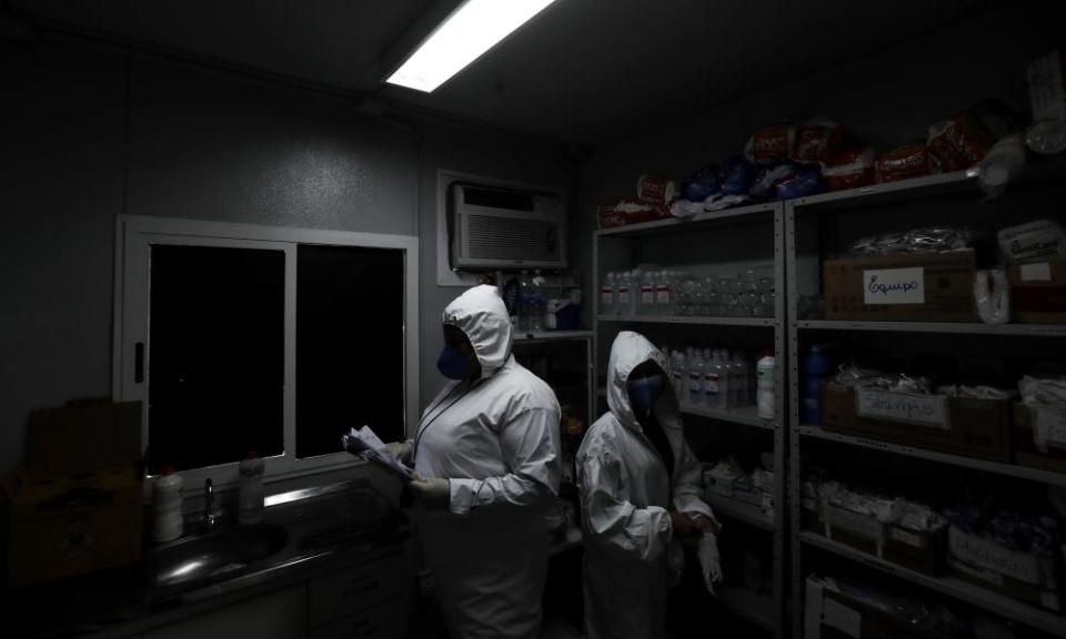 Nurses prepare to attend to Covid patients at Nova Iguacu General Hospital.