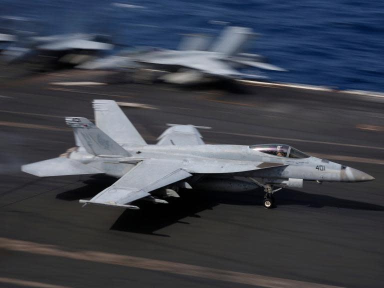 F-18 jet and tanker crash in mid-air during refuelling near Japan