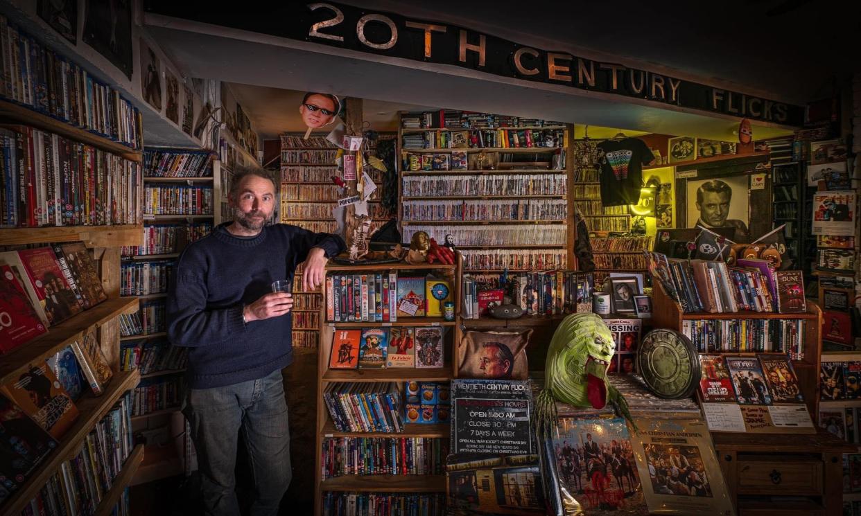 <span>Be kind, rewind … Dave Taylor at 20th Century Flicks, Bristol.</span><span>Photograph: Andre Pattenden</span>