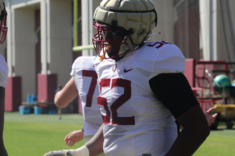 FSU offensive lineman Robert Scott runs to the next drill during one of the Seminoles' 2022 spring football practices.