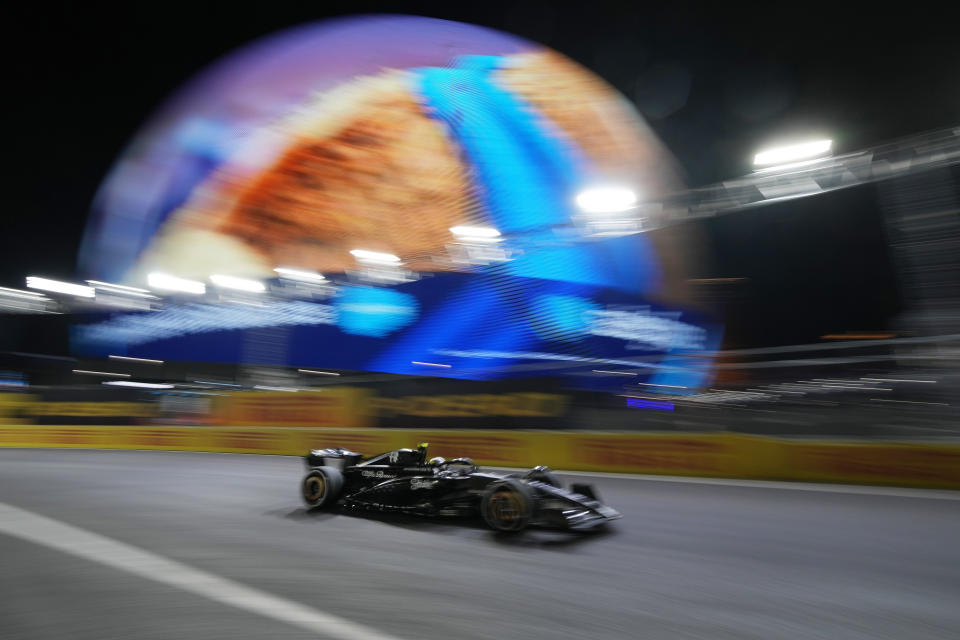 Alfa Romeo driver Guanyu Zhou, of China, drives during the first practice session for the Formula One Las Vegas Grand Prix auto race, Thursday, Nov. 16, 2023, in Las Vegas. (AP Photo/John Locher)