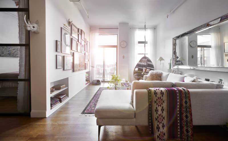 White sectional in sunny living room.