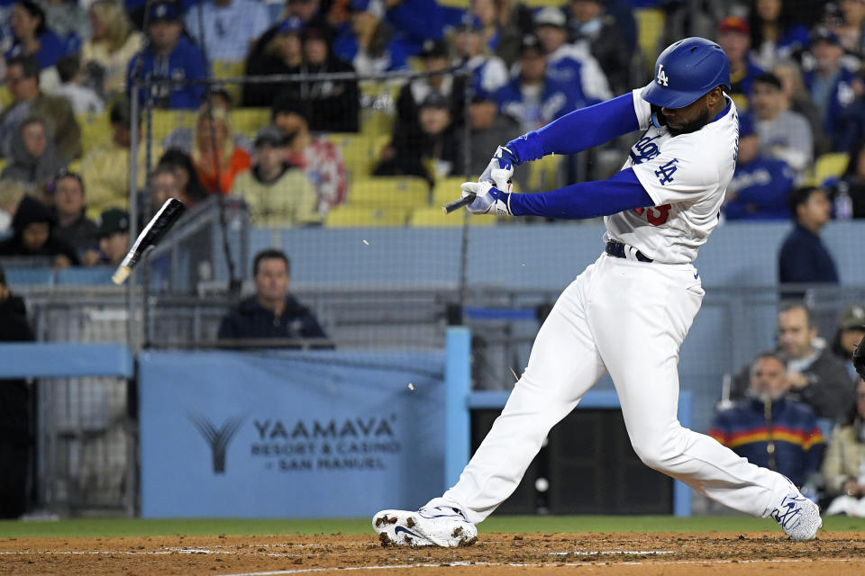 Los Angeles Dodgers' Jason Heyward breaks his bat as he grounds out during the sixth inning of a baseball game against the Arizona Diamondbacks Saturday, April 1, 2023, in Los Angeles. (AP Photo/Mark J. Terrill)