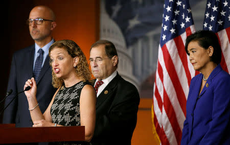 U.S. House Democrats Ted Deutch (D-FL), Debbie Wasserman Schultz (D-FL), Jerrold Nadler (D-NY) and Judy Chu (D-CA) hold a news conference to ask the Justice Department to investigate the Trump Foundation's donations to Florida Attorney General Pam Bondi in Washington, U.S., September 14, 2016. REUTERS/Gary Cameron
