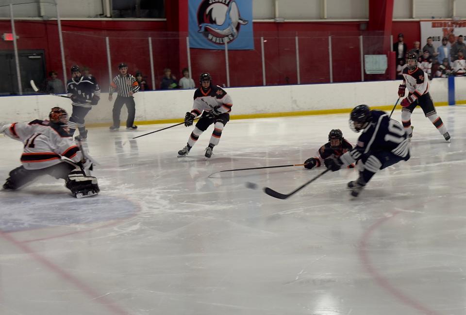 Timothy Gorlenko makes the go ahead shot in the third period of Midd South's 4-2 victory over Midd North.