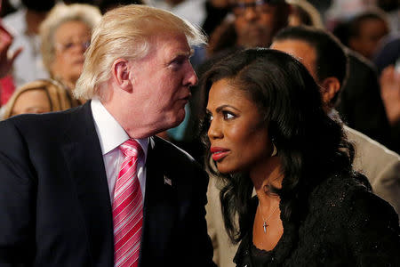 FILE PHOTO: Republican presidential nominee Donald Trump and Omarosa Manigault attend a church service, in Detroit, Michigan, U.S., September 3 2016. REUTERS/Carlo Allegri/File Photo