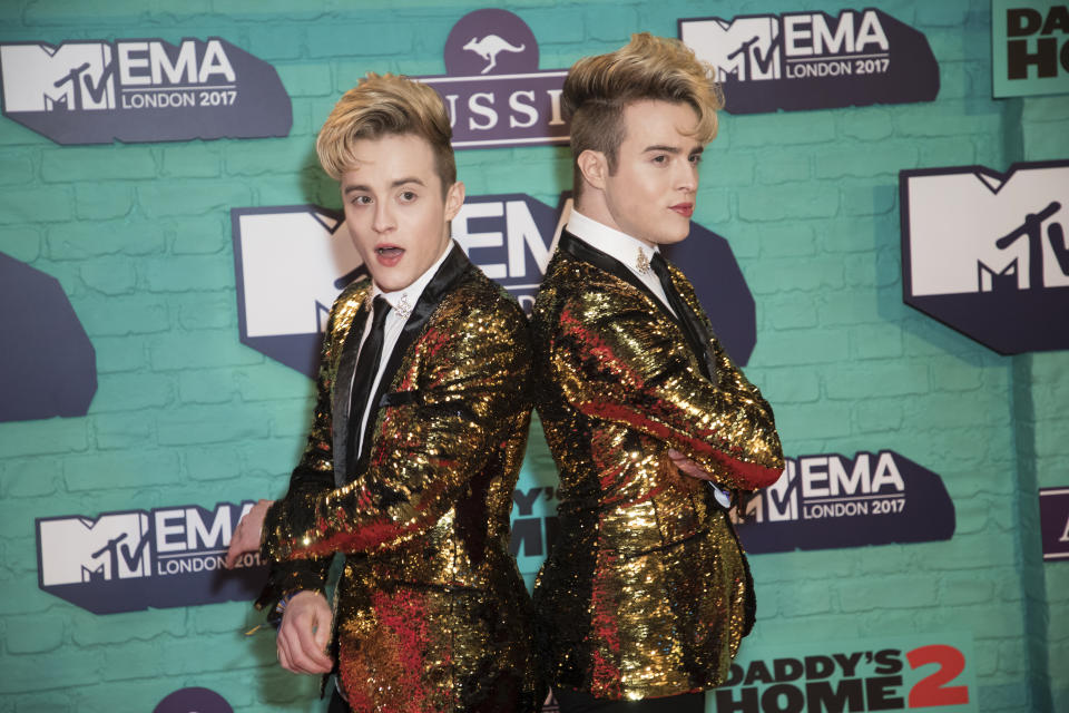 Jedward pose for photographers upon arrival at the MTV European Music Awards 2017 in London, Sunday, Nov. 12th, 2017. (Photo by Vianney Le Caer/Invision/AP)