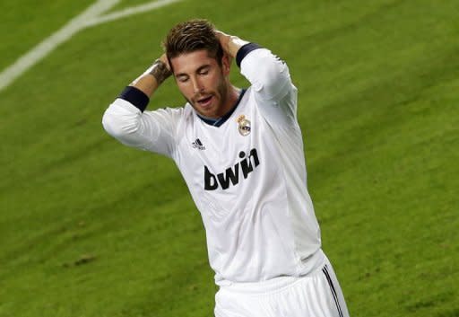 Real Madrid's defender Sergio Ramos reacts during the Spanish League Clasico football match FC Barcelona vs Real Madrid CF at the Camp Nou stadium in Barcelona